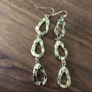 Candie's Yellow gold dangle wavy loop earrings